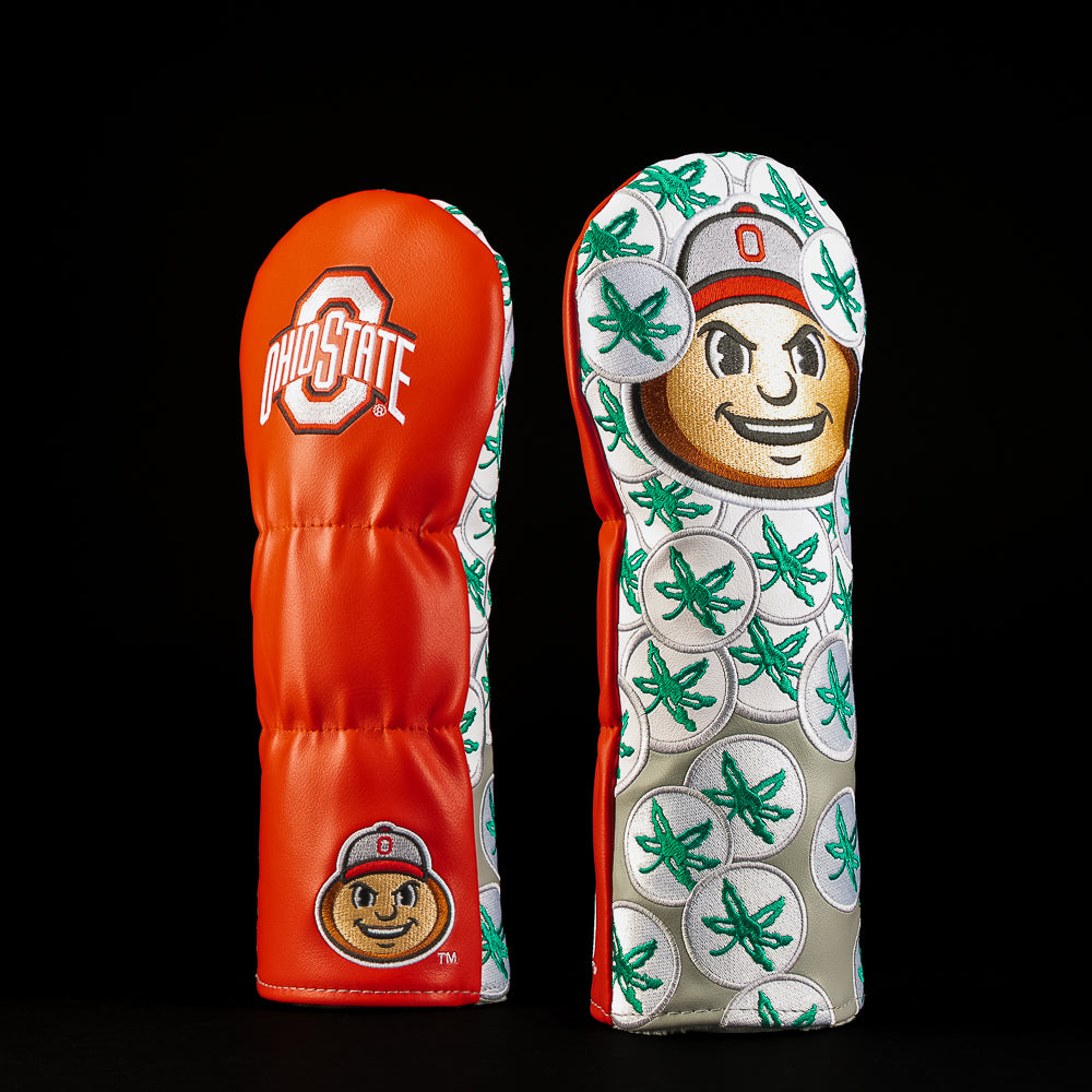 Red and white Ohio State fairway golf headcover featuring the Ohio State logo, Brutus Buckeye in a football helmet and repeating green buckeye leaf graphics.