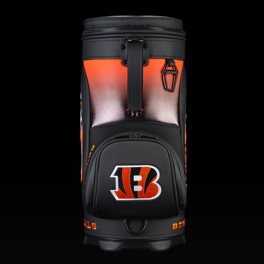 Rear view of the SWAG Golf Cincinnati Bengals Den Caddy Cooler with orange and black color blocking.