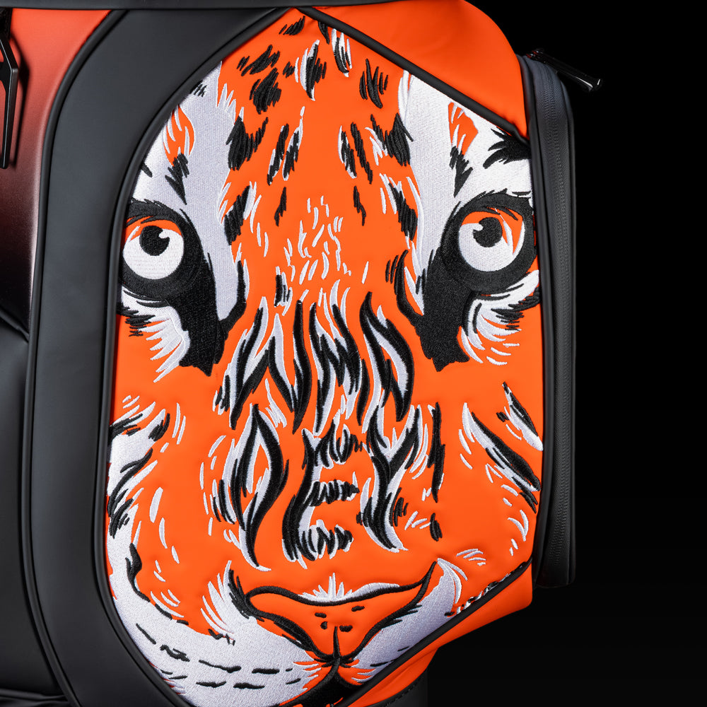 Close-up of the tiger artwork featuring piercing eyes, orange stripes, and black and white details.