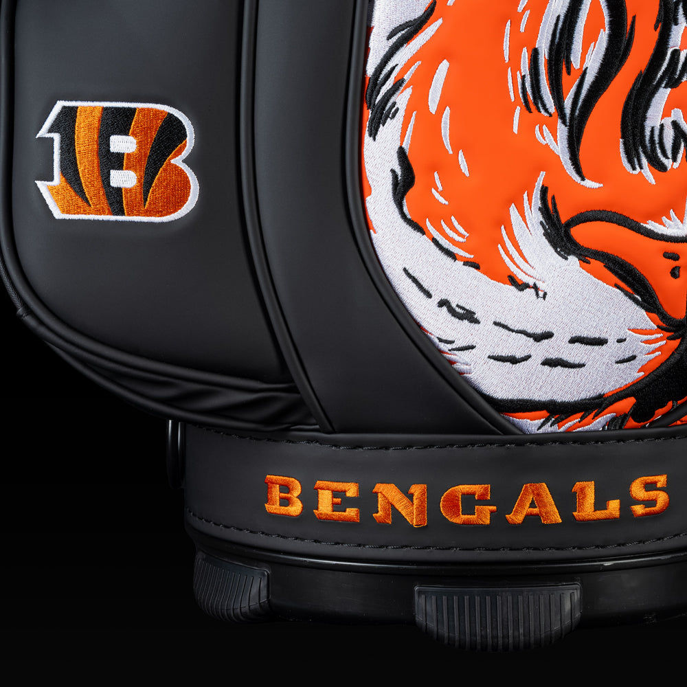 Close-up of the embroidered Bengals logo on the front pocket with the tiger artwork in the background.