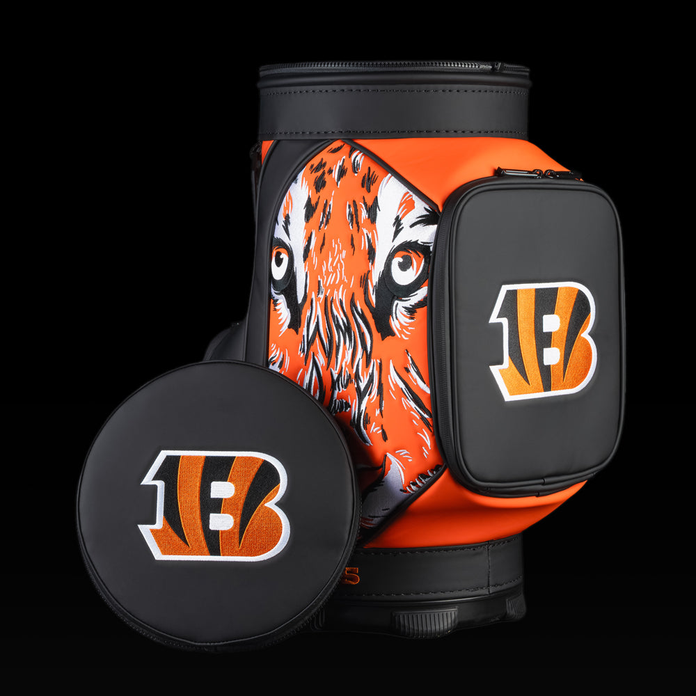 Cincinnati Bengals Den Caddy Cooler displayed with the removable embroidered lid beside the cooler.