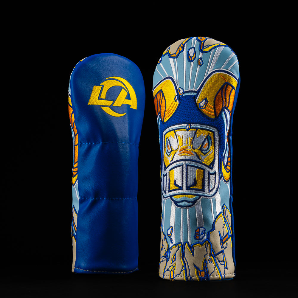 LA Rams fairway cover with a ram in a helmet in the middle and “RAMS” in crushed pavement