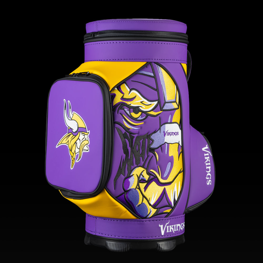 Angled view of the SWAG Golf Minnesota Vikings Den Caddy Cooler showcasing the Viking warrior artwork and embroidered Vikings logo pocket.