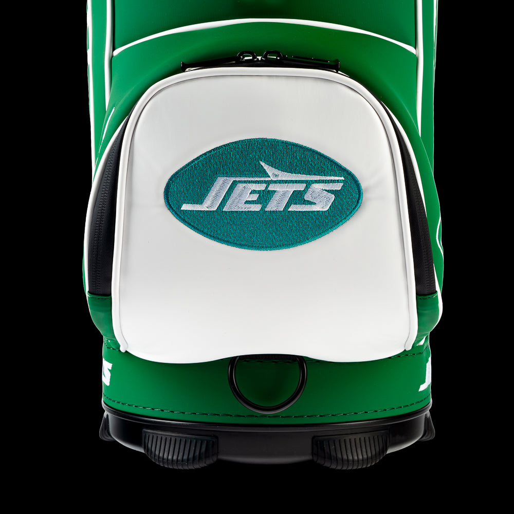 Close-up view of the SWAG Golf New York Jets Den Caddy Cooler with an embroidered Jets logo on the front pocket.