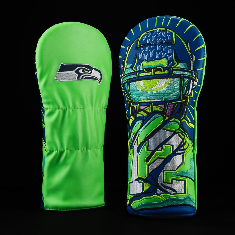 Seattle Seahawks driver cover with player holding his gloves out with the number 12 printed on them.