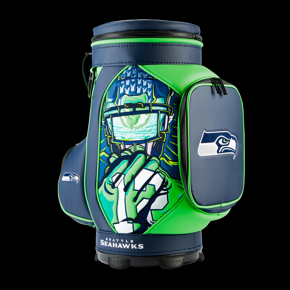 Angled view of the SWAG Golf Seattle Seahawks Den Caddy Cooler showcasing the futuristic Seahawks fan artwork and embroidered Seahawks logo pocket.