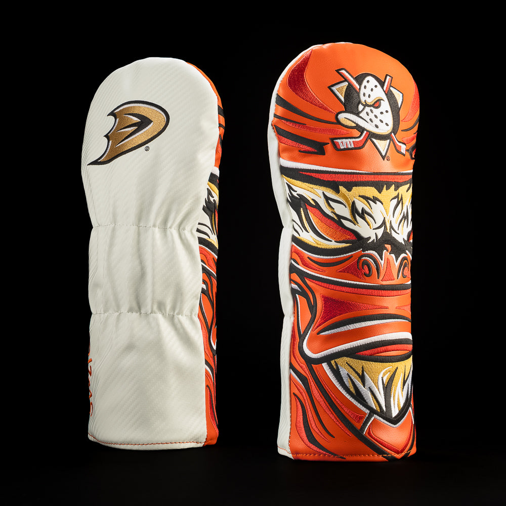 White Anaheim Ducks driver cover featuring the Anaheim Ducks logo and orange hockey mask artwork with a duck bill and feathers.
