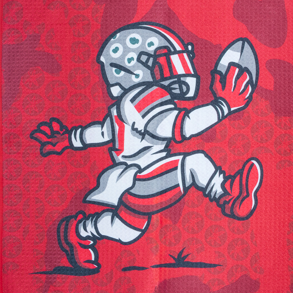 Red golf towel with Ohio State logo and cartoon character on a black background