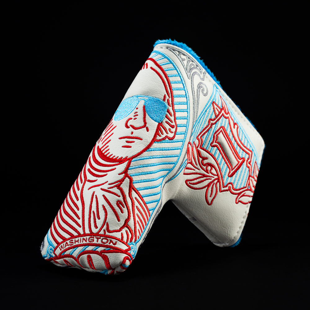 White Gigantic George with red, and blue blade golf club headcover.