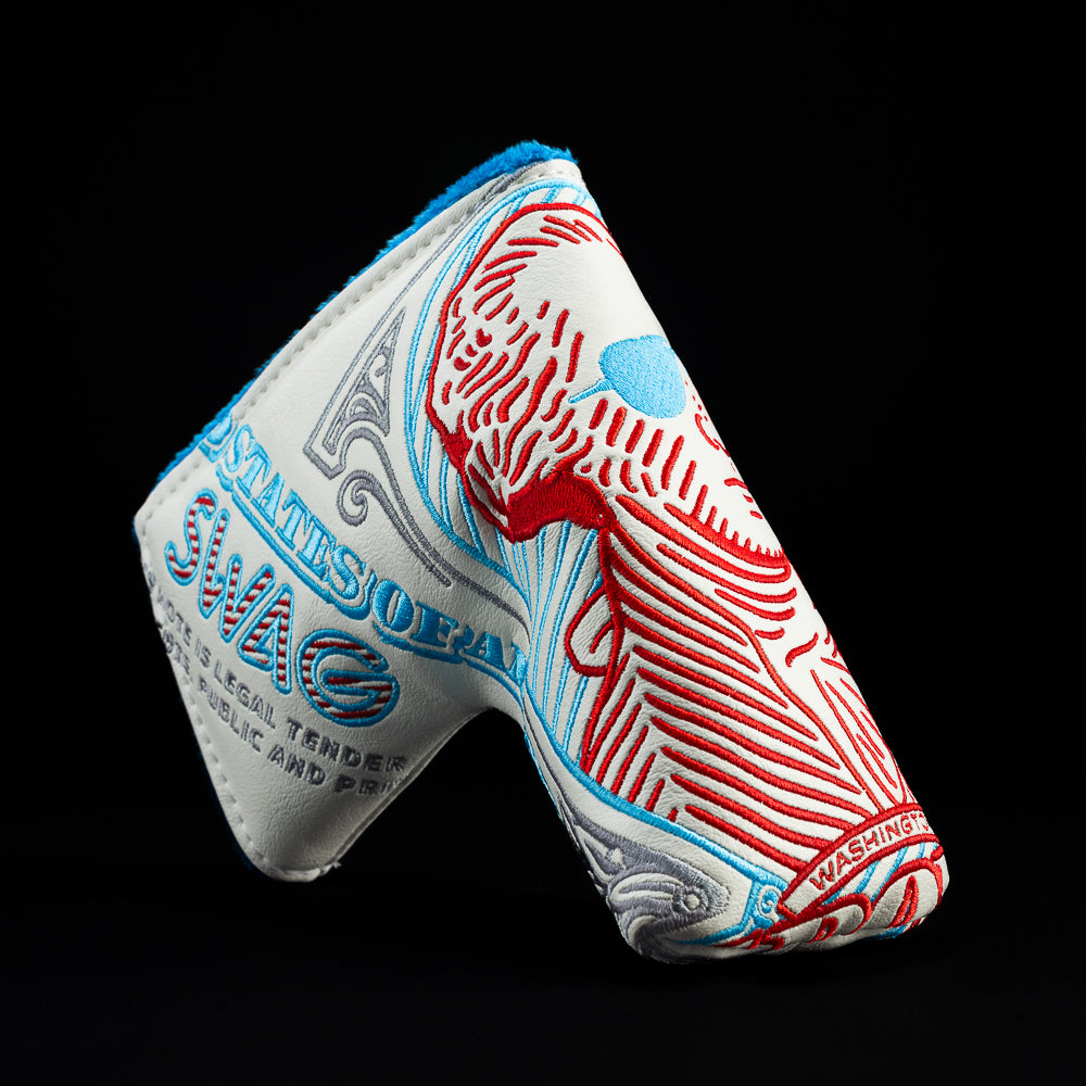 White Gigantic George with red, and blue blade golf club headcover.