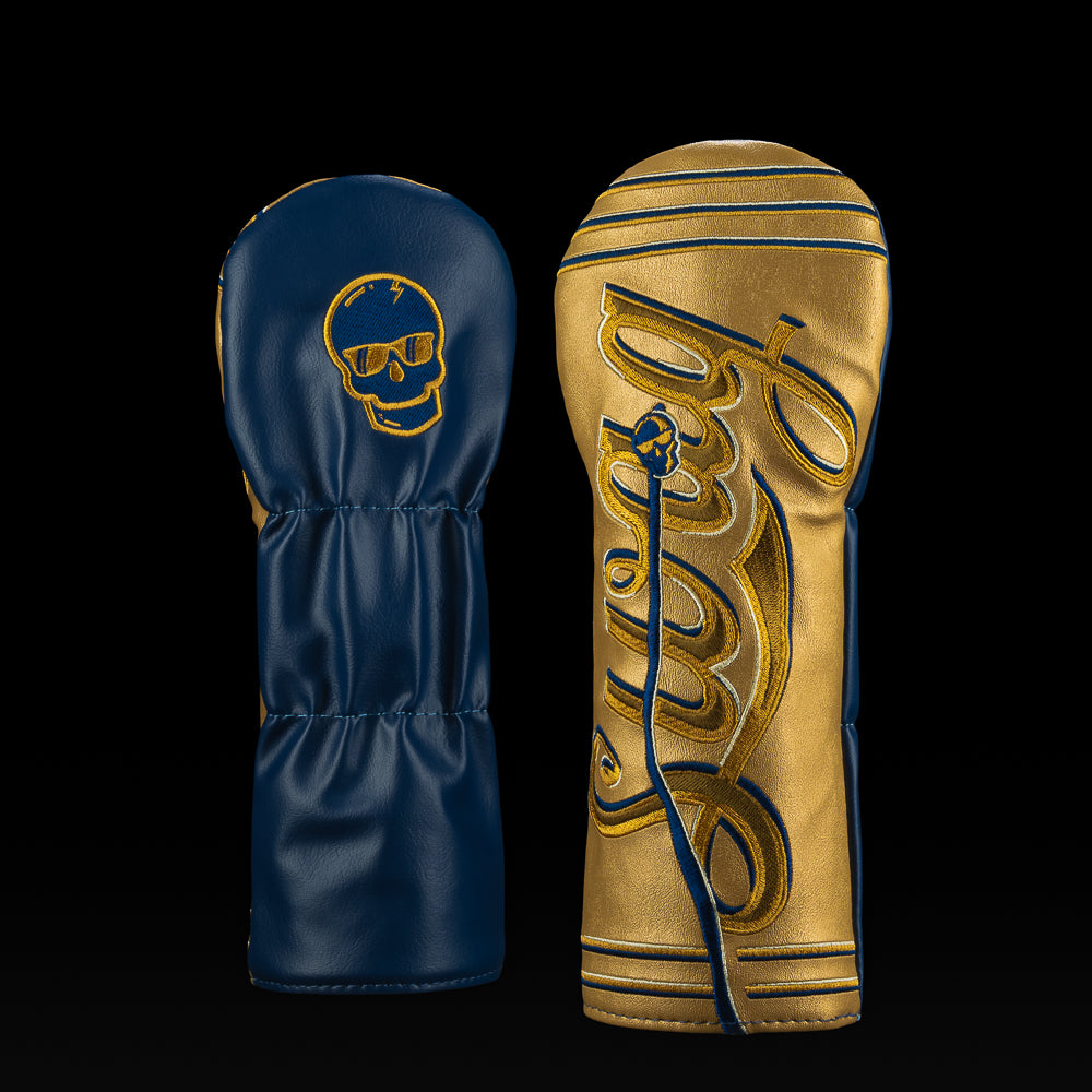 SWAG Golf Philly Freedom fairway cover with metallic gold leather, navy blue accents, and skull graphics.