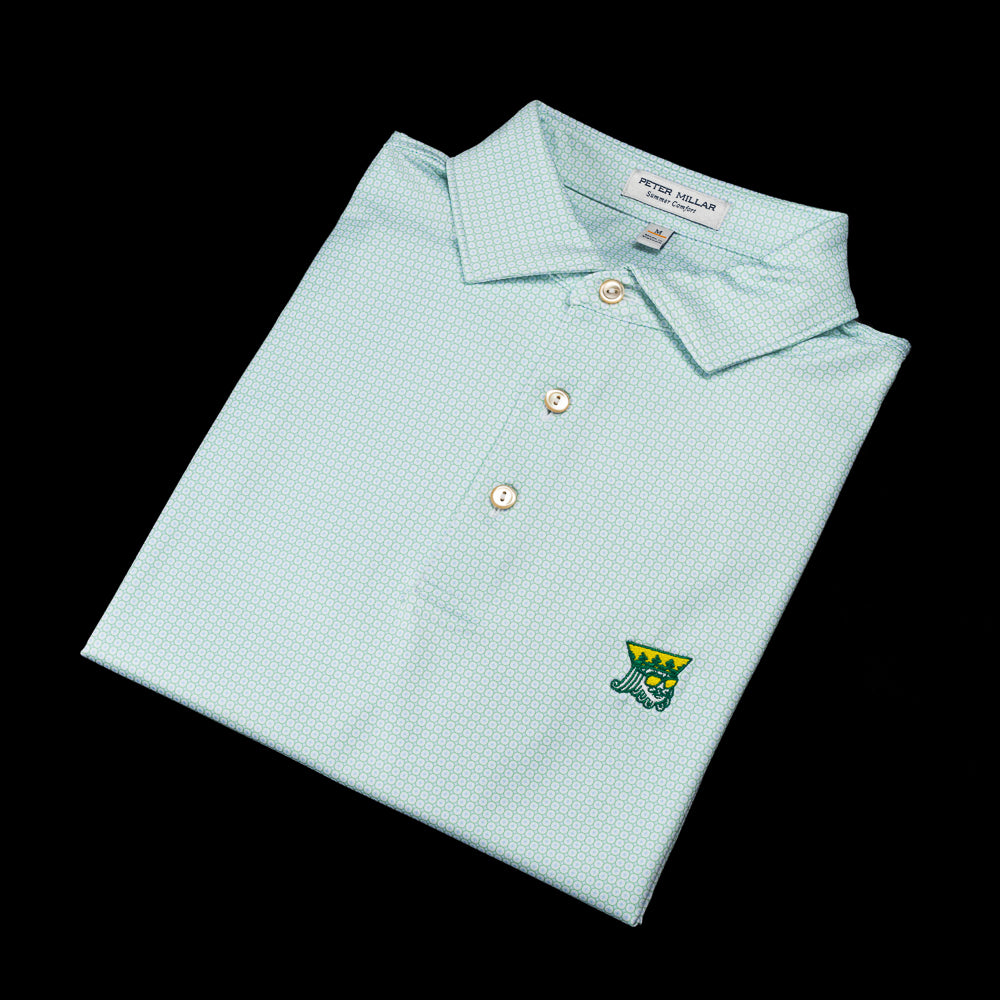 Peter Millar x SWAG Golf men's short sleeve green and blue geo print performance golf polo shirt.