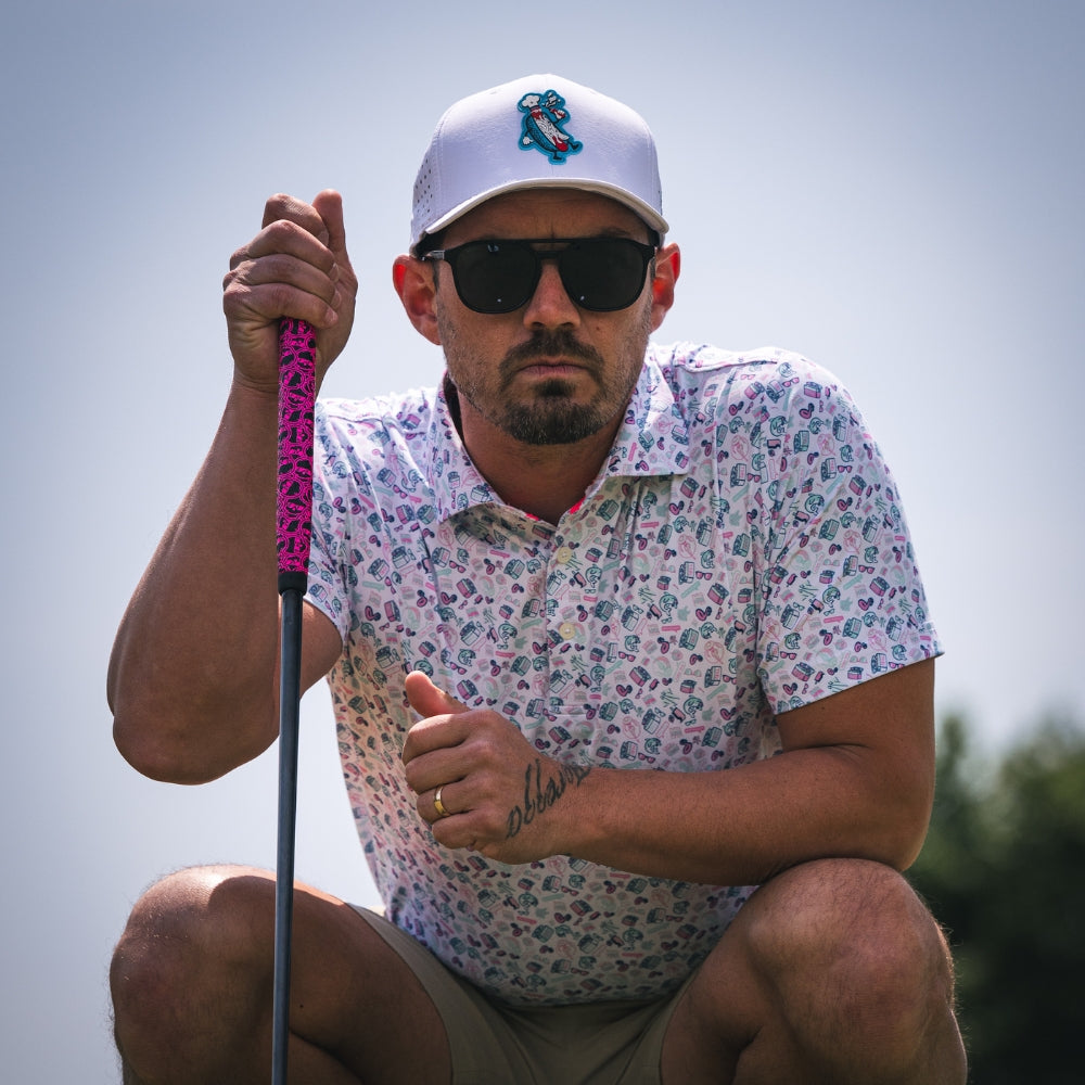 SWAG Golf pool party themed men's short sleeve classic golf polo with a micro print featuring flamingoes, coolers, popsicles and more.