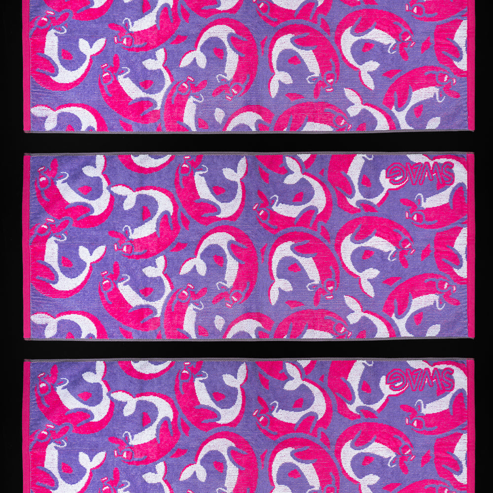 Pink and purple Flipper dolphin graphic golf towel accessory.