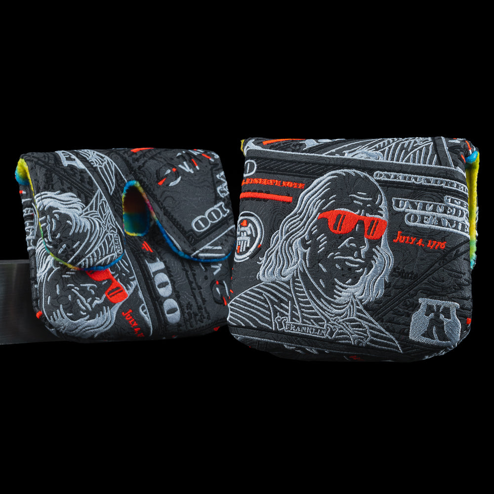 SWAG Golf Almighty Dollar 6.0 black, white, and red Ben Franklin dollar bill themed center shaft XL mallet golf headcover.