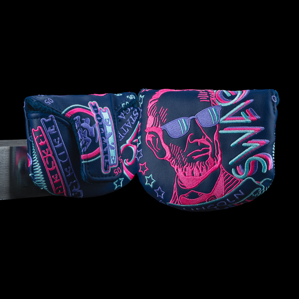 SWAG Golf Gigantic Lincoln boss mallet cover with large Lincoln graphic, blue and pink neon color details, and SWAG branding.