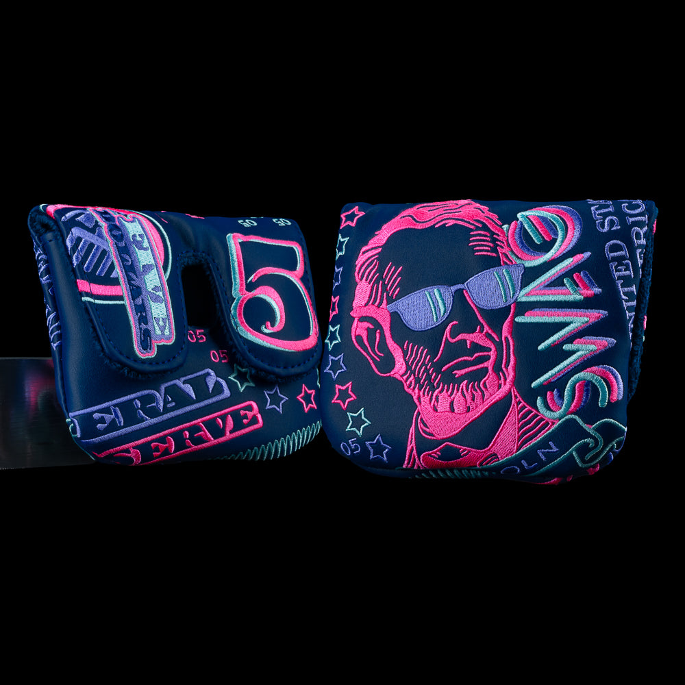 SWAG Golf Gigantic Lincoln large center shaft mallet cover with oversized Lincoln graphics, blue and pink neon accents, and SWAG branding.