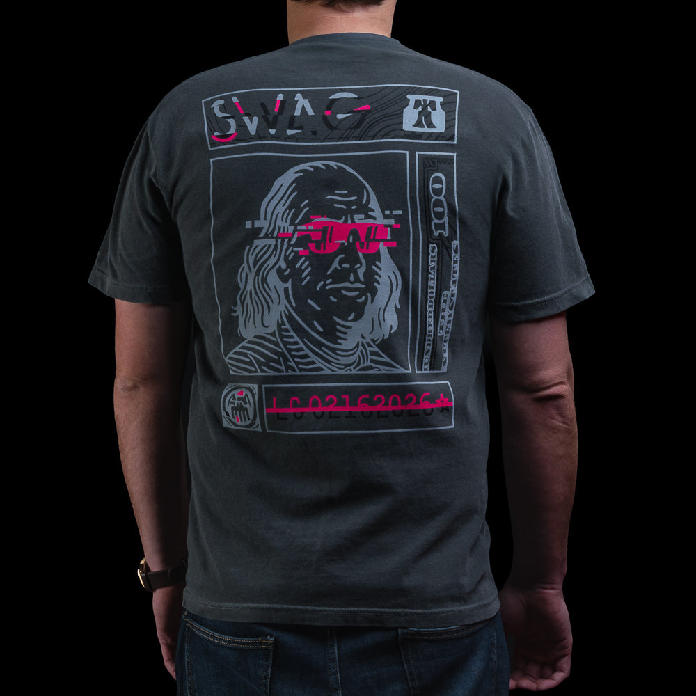 Back of SWAG Golf Glitched Out Benji t-shirt with large Benjamin Franklin graphic wearing pink glitch sunglasses and bold SWAG artwork.