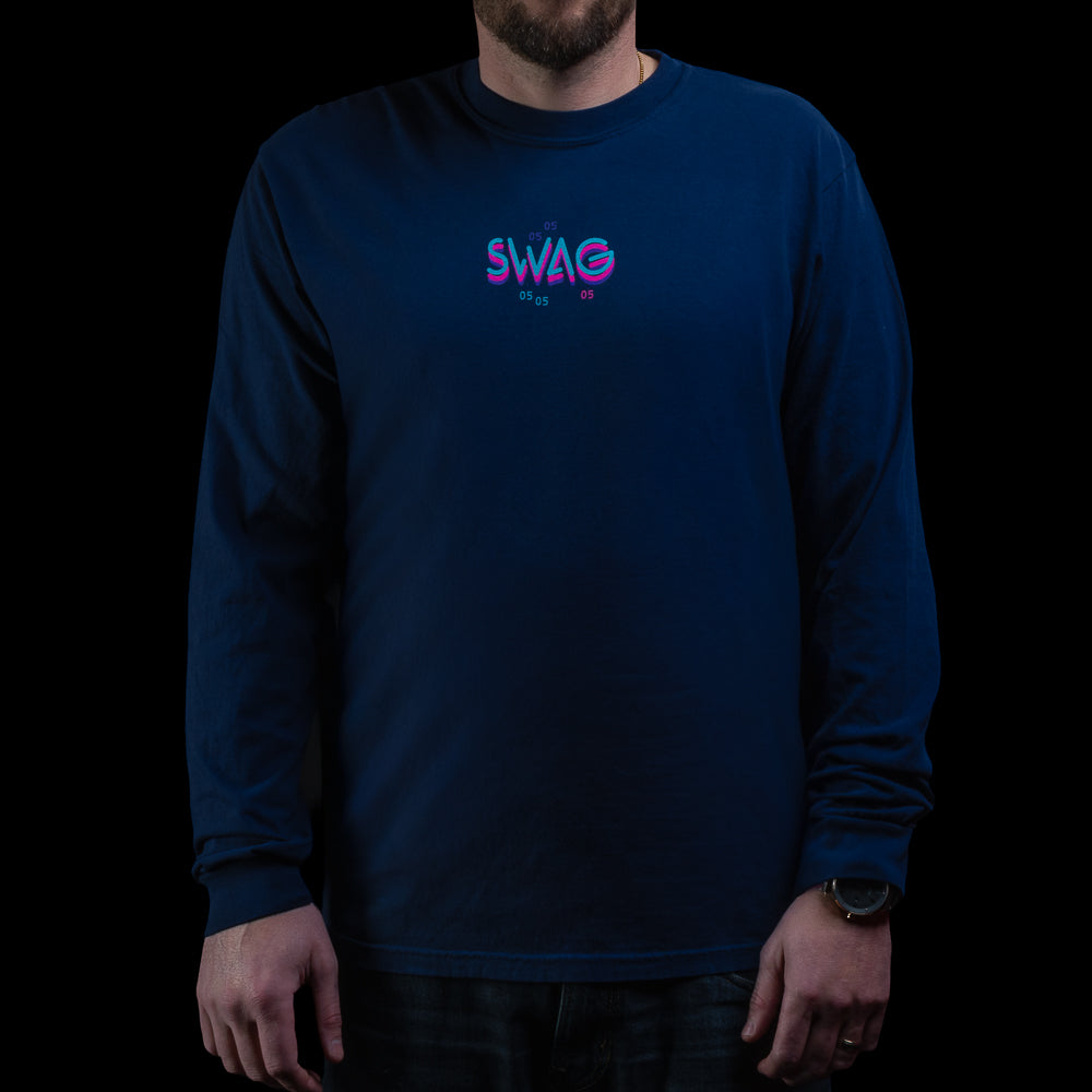 SWAG Golf Gigantic Lincoln navy long sleeve shirt featuring neon pink and teal SWAG logo with 05 detail on chest.
