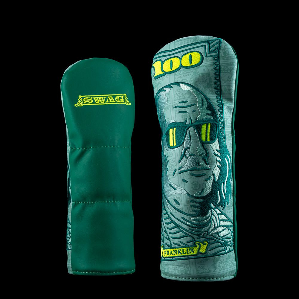 Green Macro Dollar Franklin fairway cover with oversized currency artwork, SWAG Golf branding, and Franklin in shades.
