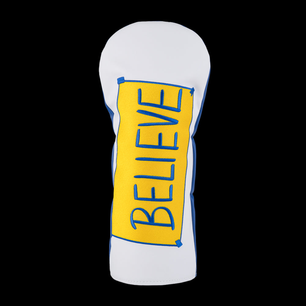 Rewing Golf x Ted Lasso white and blue driver headcover with yellow and blue "BELIEVE" sign from the tv show locker room.
