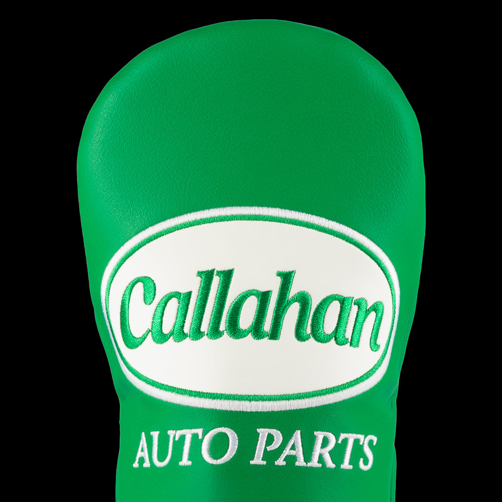 Green Callahan Auto Parts fairway cover with white logo.