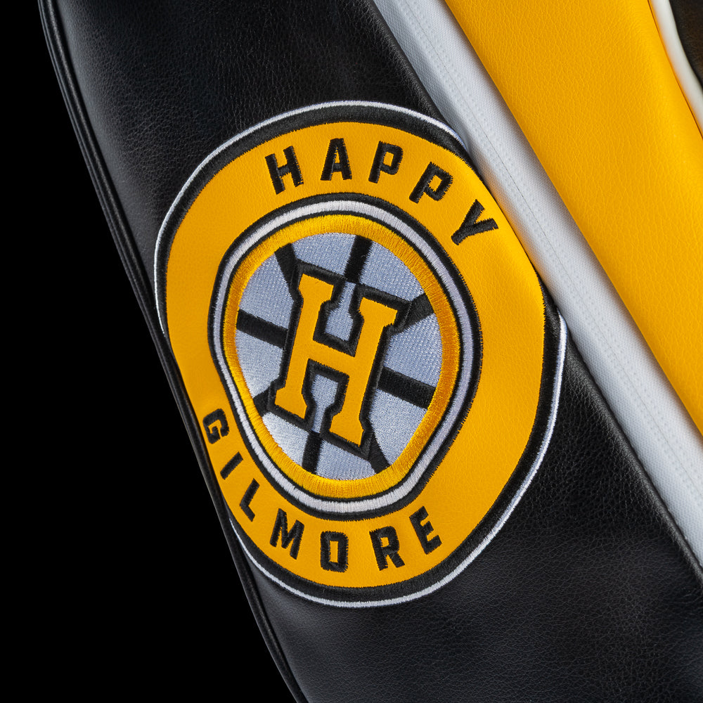 Yellow and black golf bag with 'Gilmore' branding on a white background