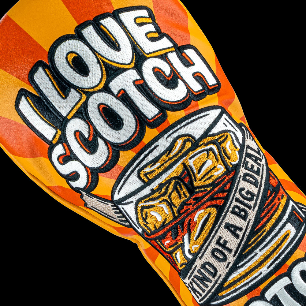Rewind Golf x Anchorman I Love Scotch orange and yellow official driver golf headcover with whiskey glass embroidered on the front.