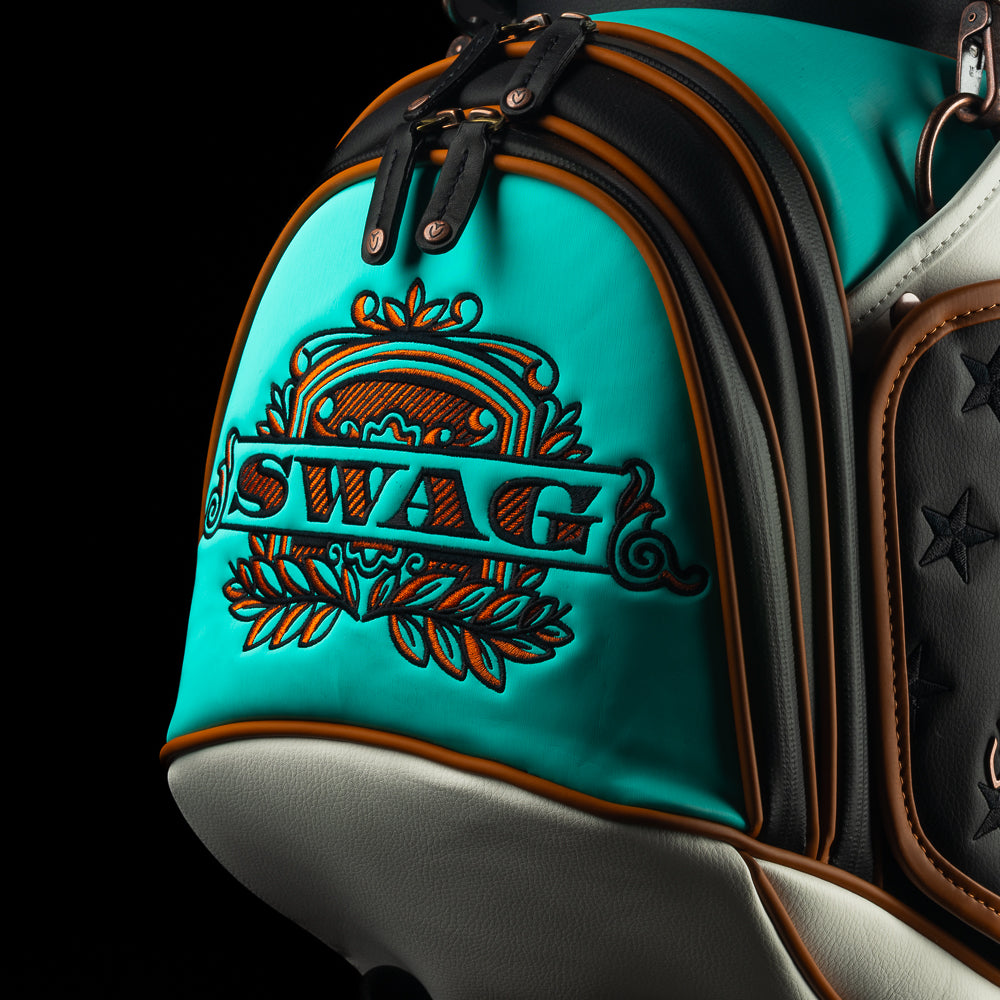 SWAG x Vessel golf bag with Statue of Liberty design and 'Don't Give a Putt' text on a black background
