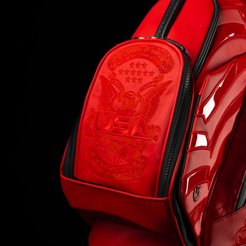 Vessel x SWAG red 2025 Ryder Cup official golf stand bag with black trim and USA themed embroidery.