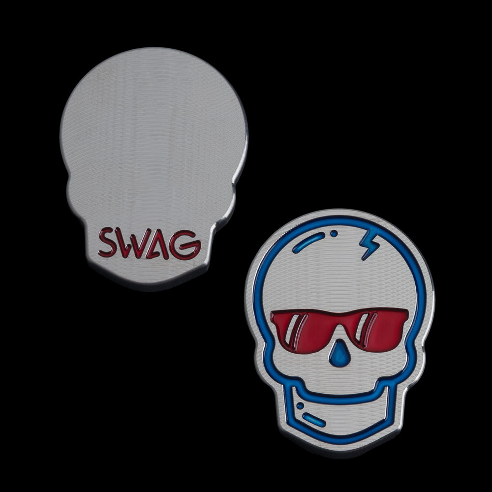 SWAG Golf USA Skull stainless steel golf ball marker with red and blue paint fill.