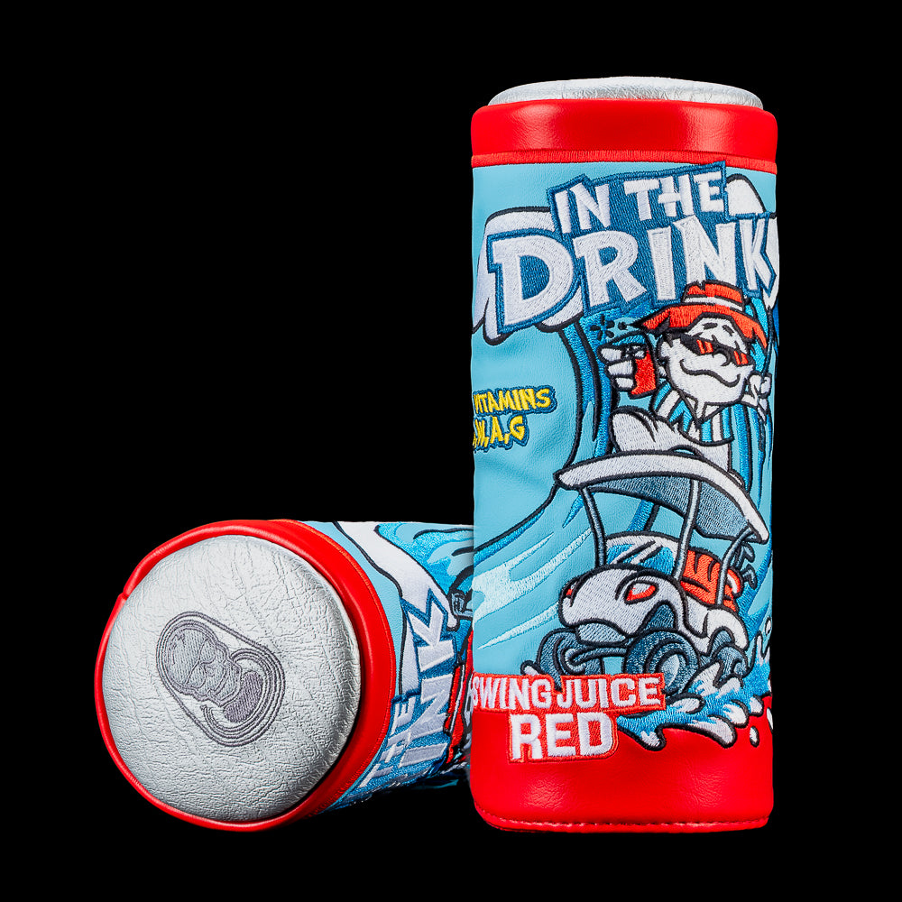 Fairway wood cover inspired by a vintage fruit drink pouch featuring a golfer in a golf cart riding a large wave with bright blue and red graphics.