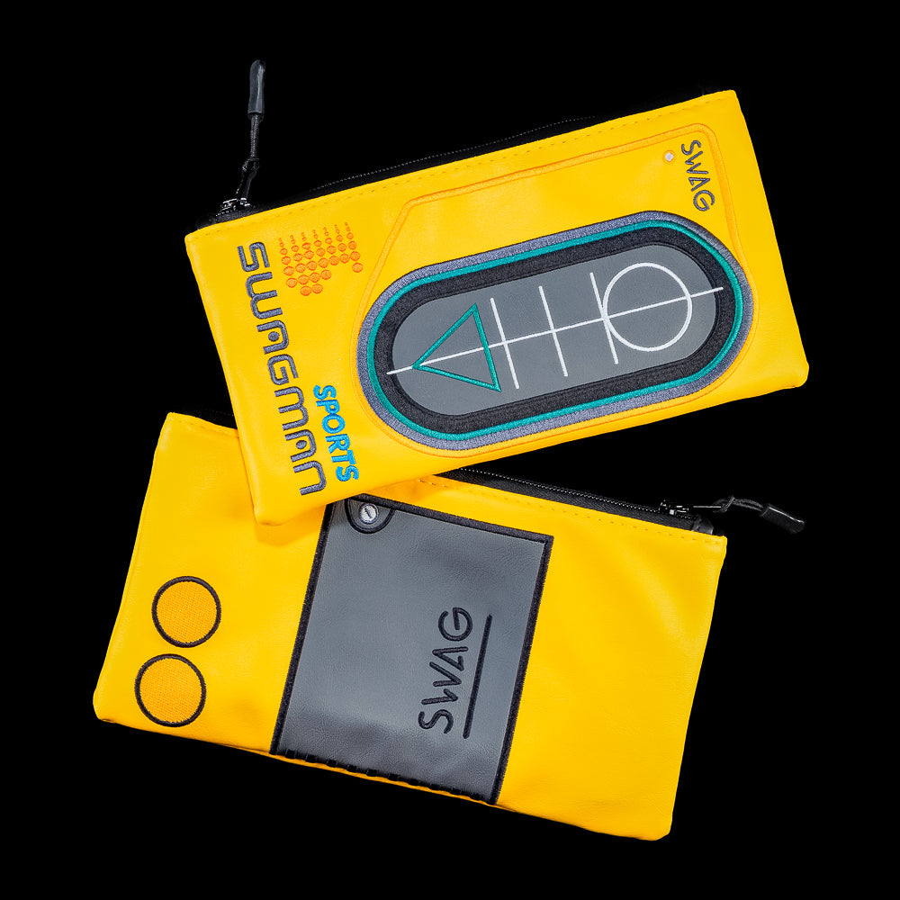 Yellow valuables pouch inspired by a vintage portable cassette player featuring retro controls, cassette tape graphics, and SWAG branding.