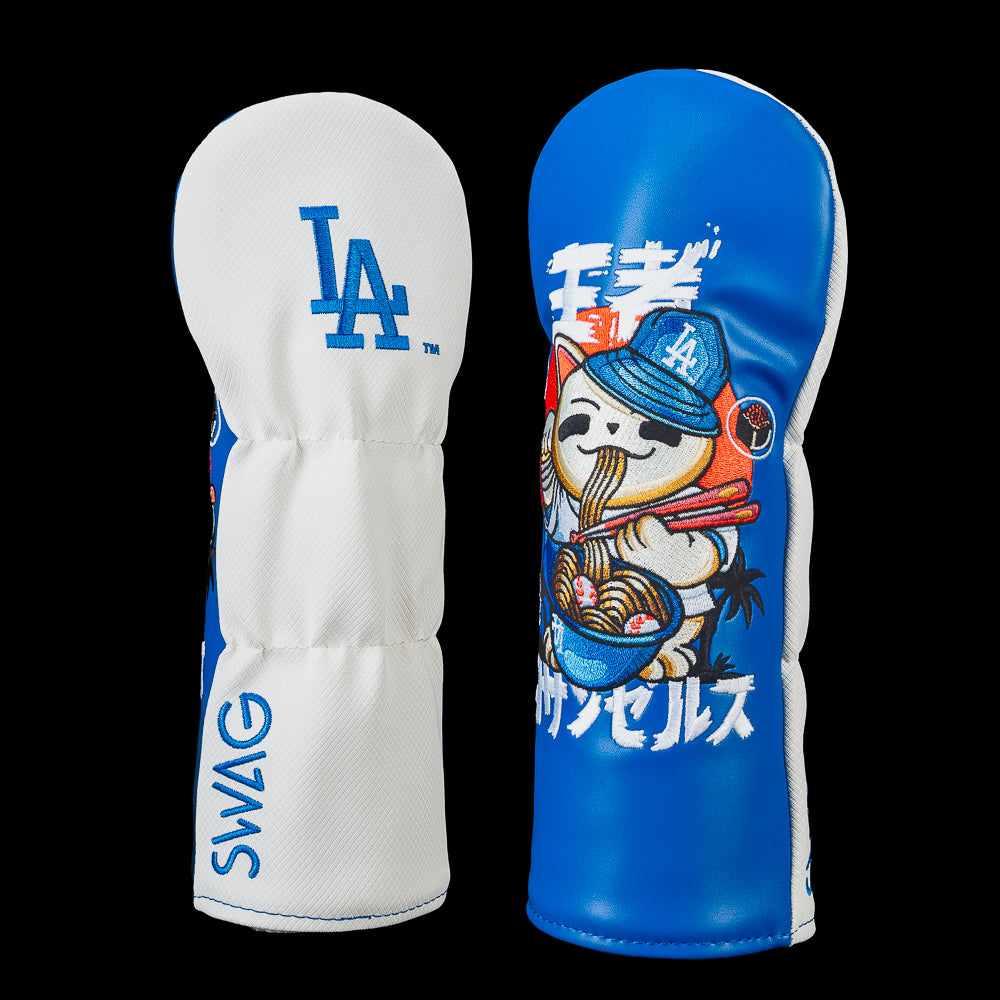 Officially licensed Los Angeles Dodgers fairway cover by SWAG Golf featuring an embroidered Lucky Cat wearing a Dodgers bucket hat, eating ramen with baseball noodles and chopsticks beneath Japanese lettering on the front, with the LA logo and SWAG branding embroidered on the back.