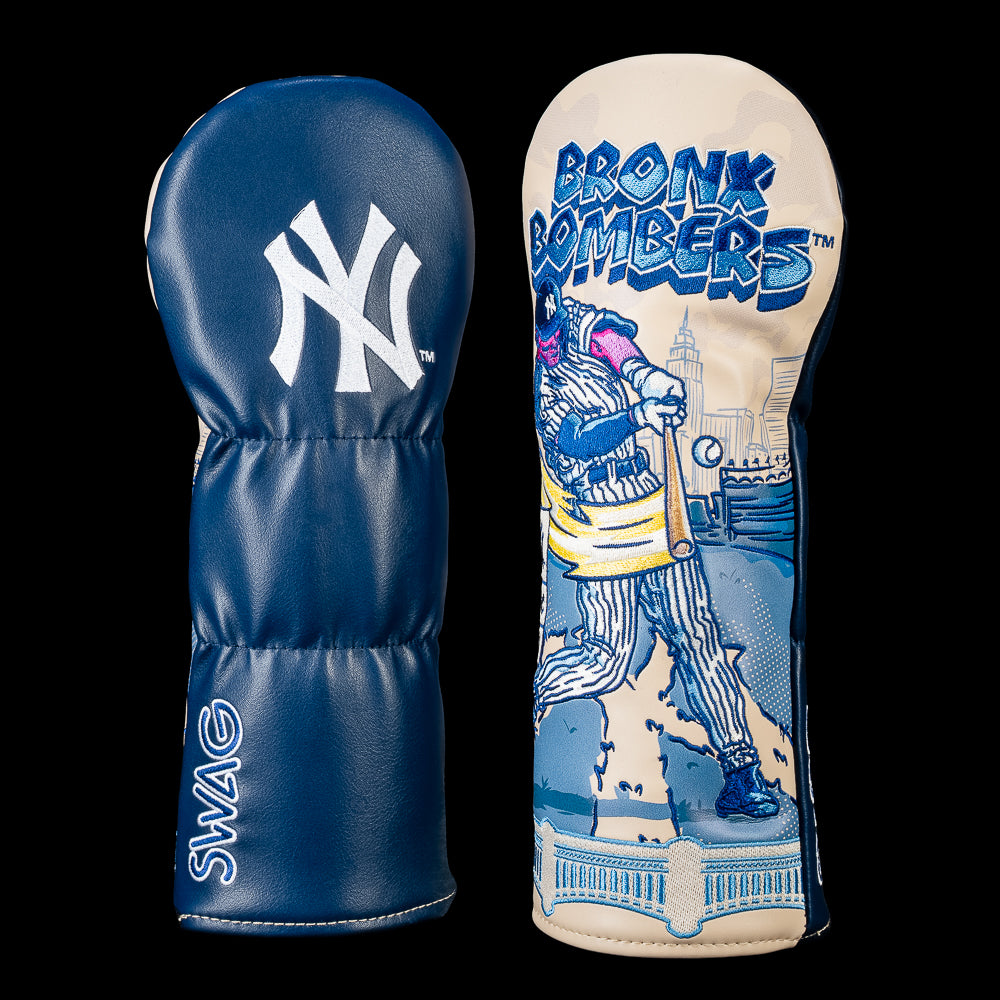 SWAG Golf New York Yankees fairway cover shown front and back with an embroidered Yankees logo on the reverse and artwork featuring a comic-style Yankees batter beneath bold "BRONX BOMBERS" lettering, a New York skyline, yellow swing trail, flying baseball, and vintage 87¢ subway sign.