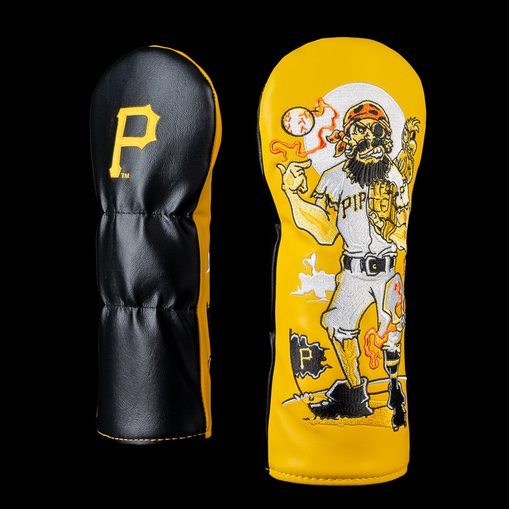 SWAG Golf Pittsburgh Pirates fairway cover shown front and back with embroidered gold Pirates logo on the reverse and artwork featuring a pirate player with an eyepatch and beard, a smoking baseball, a shoulder parrot, glowing orange flames, a Pirates flag, and a full moon.