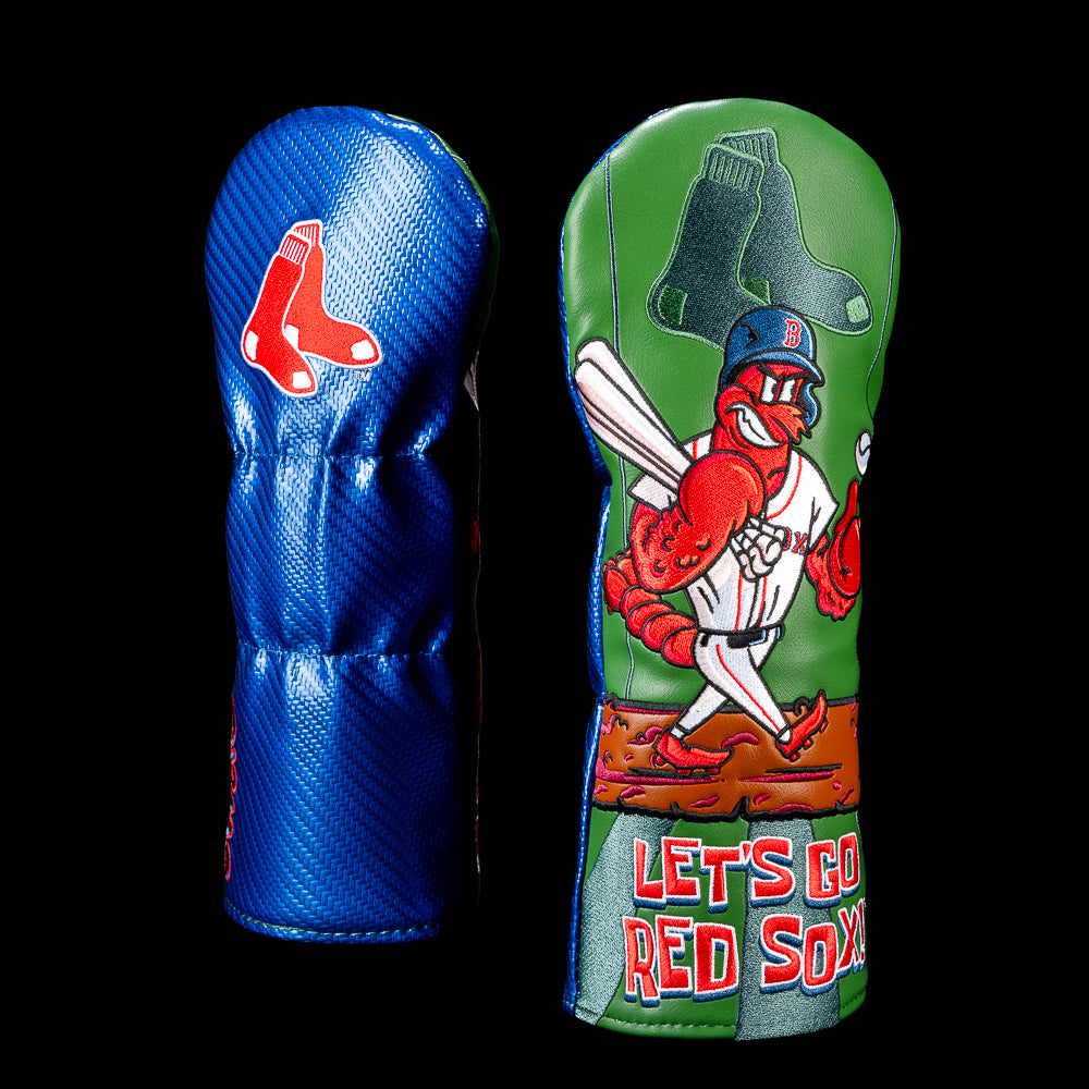 Back and front view of a Boston Red Sox fairway cover. The back features the embroidered Red Sox hanging socks logo on a blue textured panel. The front shows a cartoon lobster wearing a Red Sox uniform and sunglasses, stepping up to the plate in front of Green Monster-inspired graphics with "LET'S GO RED SOX!" embroidered across the bottom.