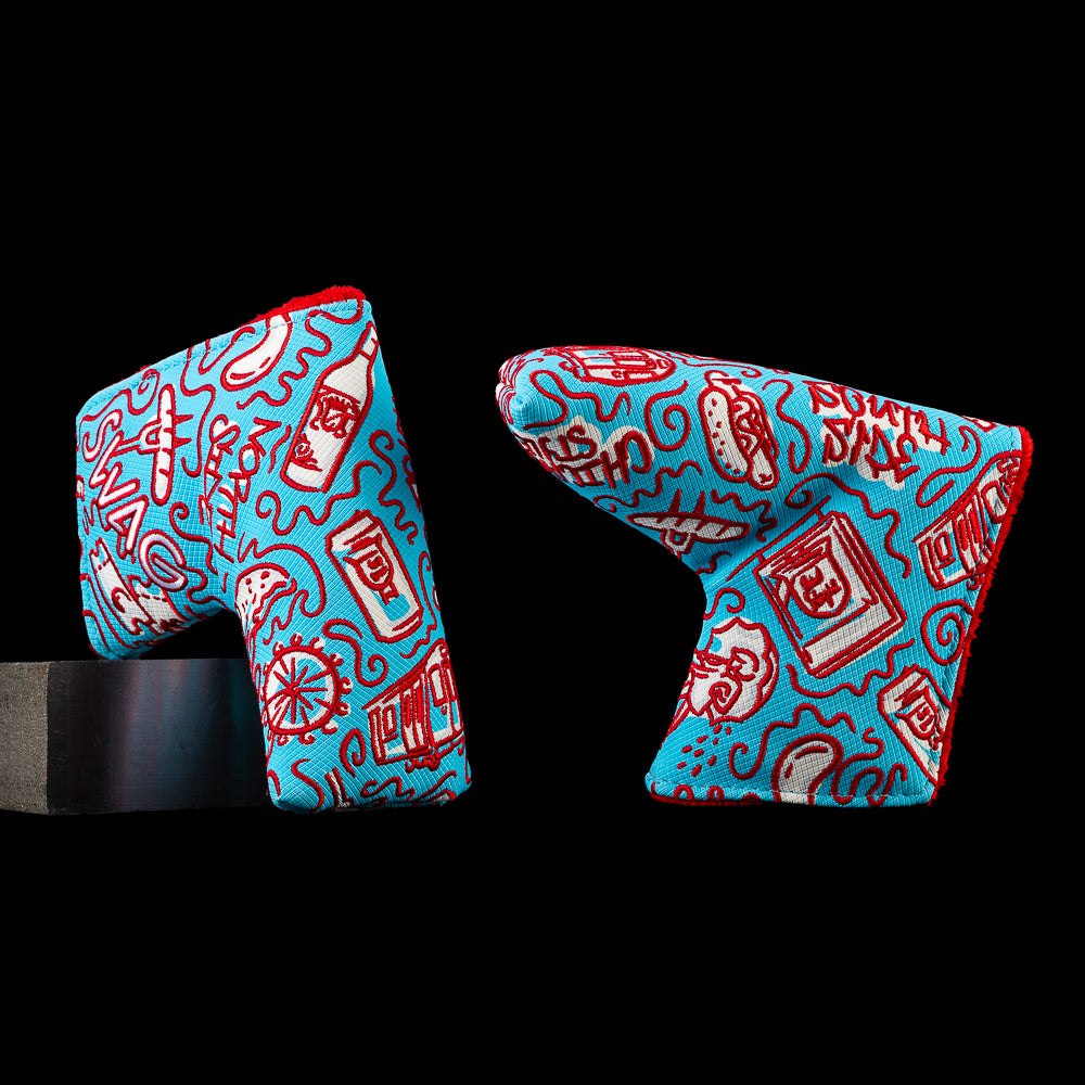 Angled front and back views of the SWAG Golf Locals Only Chicago blade putter cover featuring embroidered Chicago inspired artwork with deep dish pizza, the Chicago Theatre sign, an elevated train, hot dog, skyline details, and neighborhood icons in red and light blue.