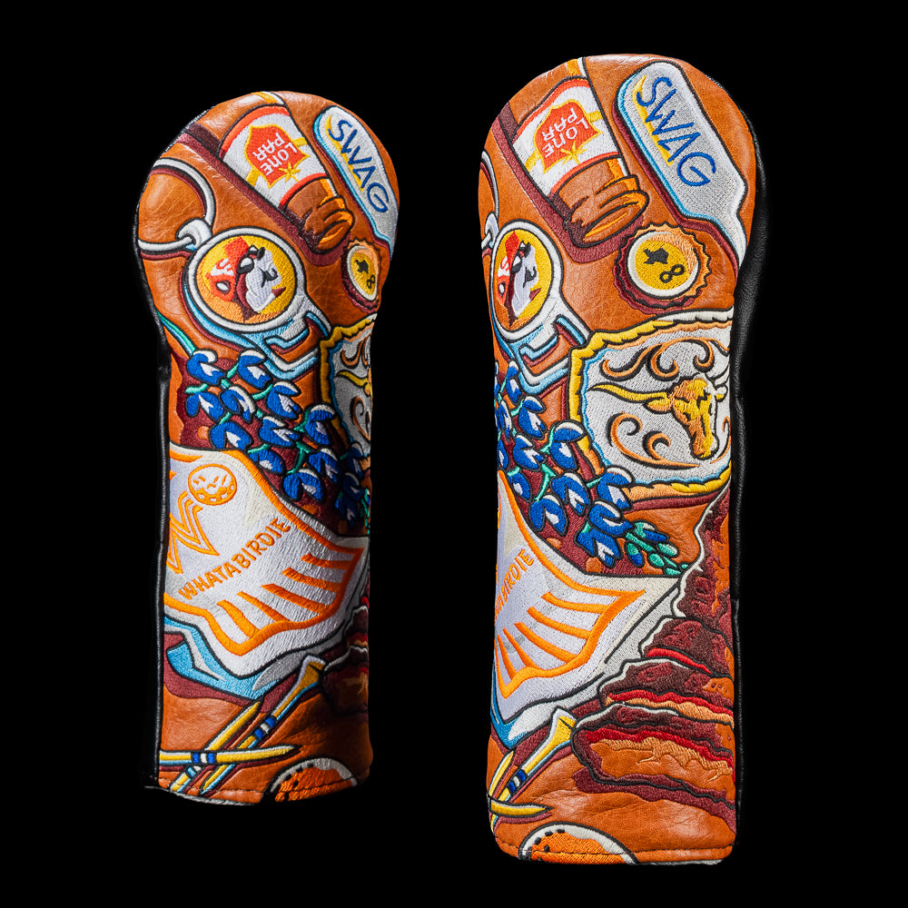 SWAG Golf Texas Essentials fairway wood cover featuring colorful embroidered Texas-inspired artwork including barbecue, bluebonnets, a longhorn skull, and SWAG patches in orange, blue, yellow, and white.