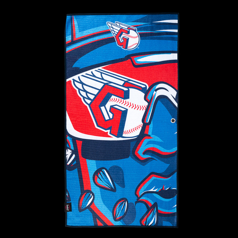 Close-up Guardian winged "G" logos layered over bold red, white, and blue comic-style graphics on an officially licensed Cleveland Guardians MLB golf towel by SWAG Golf.