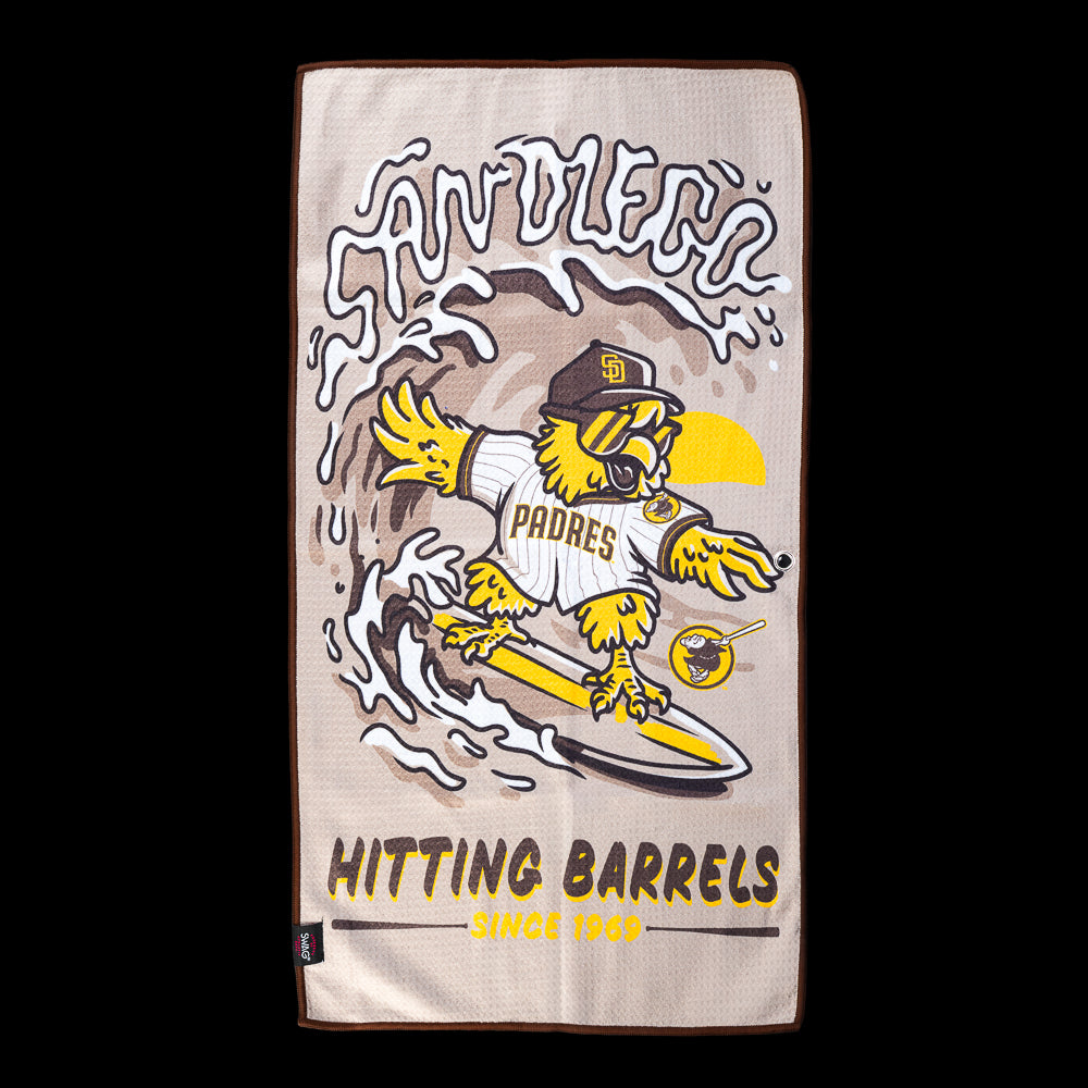 Sunglasses-wearing Padres bird surfing a wave beneath "Hitting Barrels Since 1969" and "San DIego" lettering on an officially licensed San Diego Padres MLB golf towel by SWAG Golf.