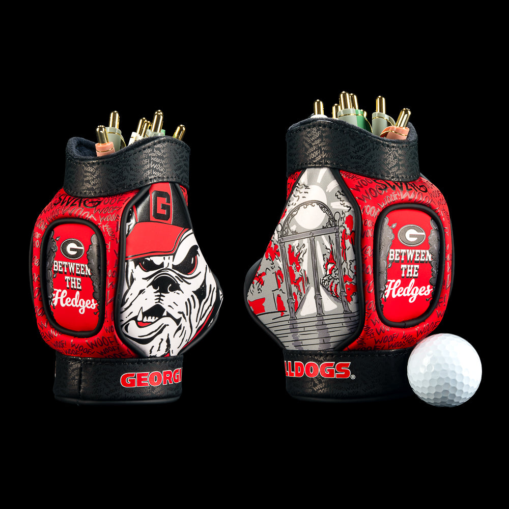 SWAG Golf Georgia Bulldogs Desk Caddy in red and black with a large bulldog face, Georgia G logos, “Between the Hedges” lettering, a stadium column illustration, and repeating red, white, grey graphics.