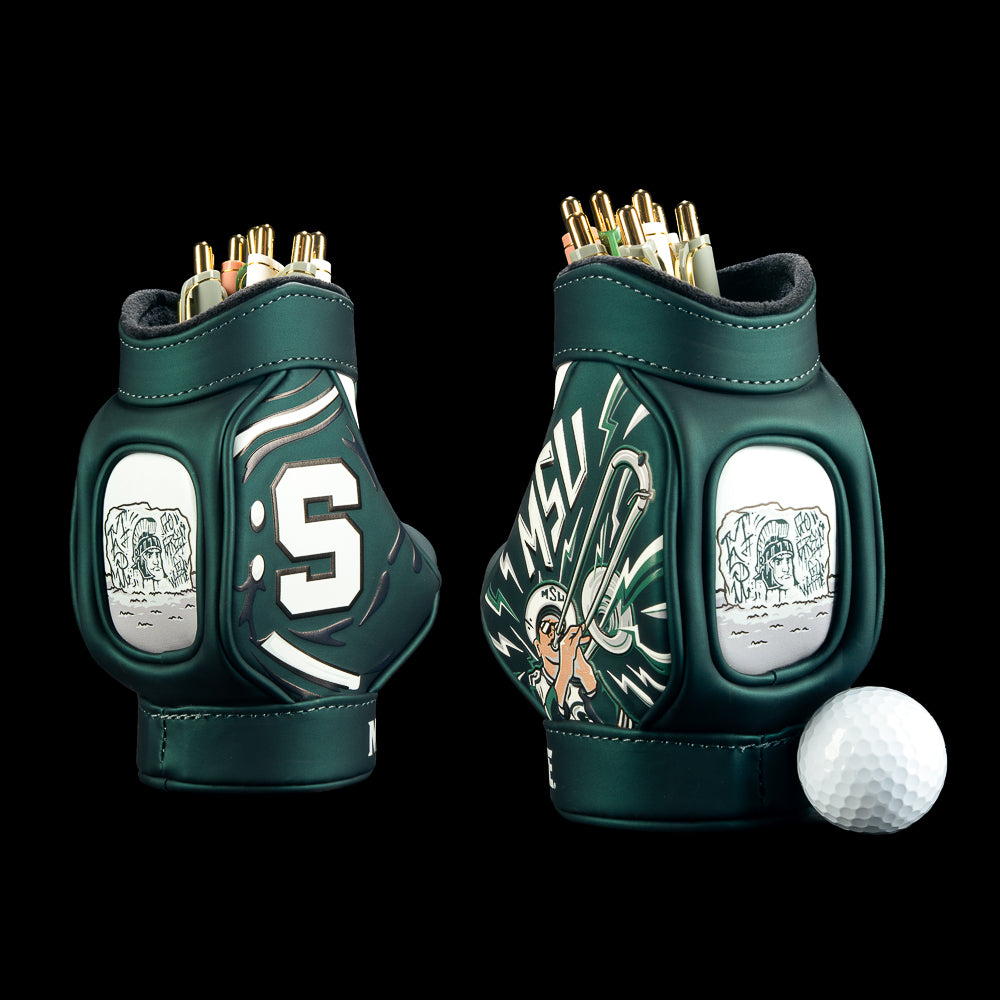 SWAG Golf Michigan State Spartans Desk Caddy featuring dark green, white, and gray artwork, oversized lettering, Spartan graphics, and striped details.