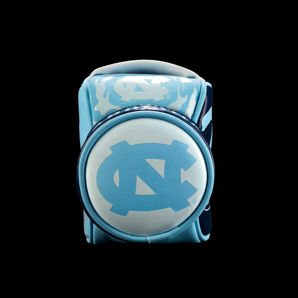 Bottom view of the North Carolina Tar Heels Desk Caddy with a large interlocking NC logo centered inside a Carolina blue circle with tonal blue patterning.