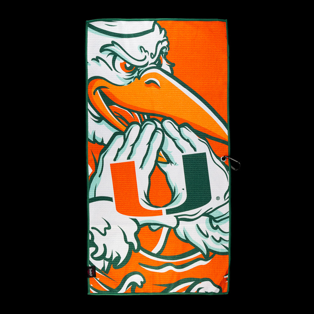 SWAG Golf University of Miami All About The U Golf Towel featuring an illustrated ibis holding the orange and green U logo.