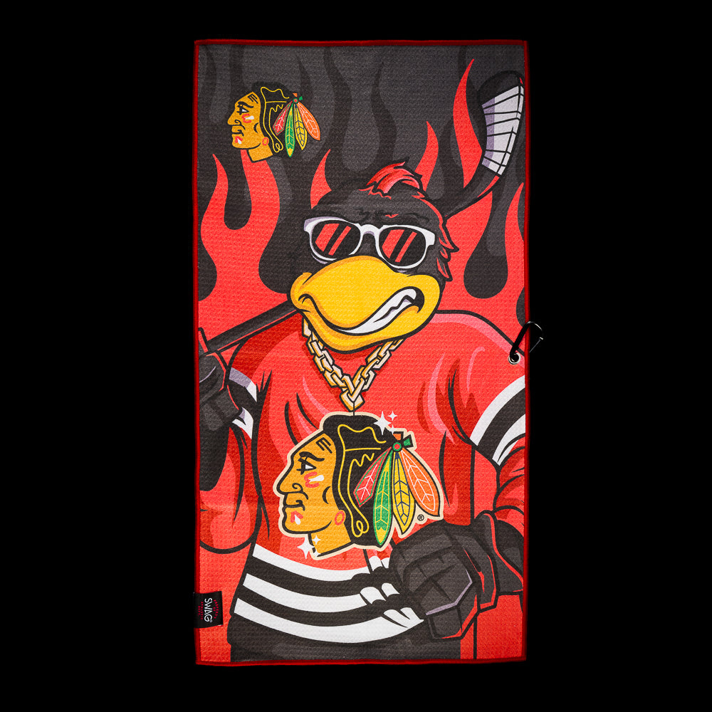 Black and red Chicago Blackhawks golf towel with a sunglasses-wearing bird, gold chain, hockey stick, flame graphics, and Chicago Blackhawks logo.