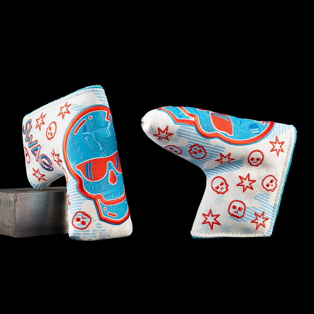 Lincoln Bill Skull blade putter cover with a blue skull wearing red sunglasses, scattered stars, small skulls, and SWAG lettering.