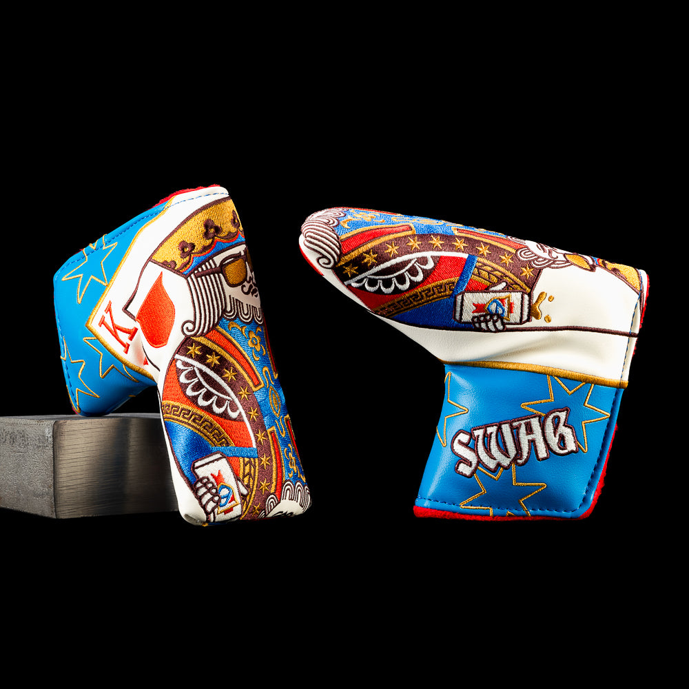Old Swag King blade putter cover with a colorful playing card King, blue side panels, gold stars, and bold embroidered details.