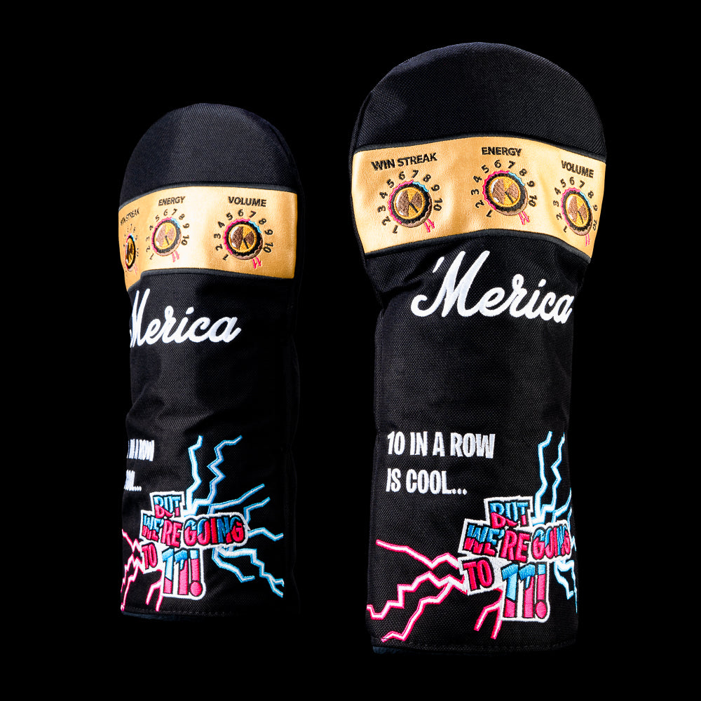 Black USA Goes to 11 driver headcover designed like an amplifier with gold control knobs, white "'Merica" script, and colorful neon lightning.