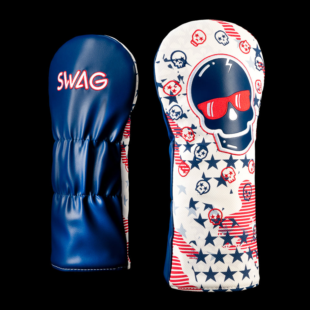 USA Skull driver headcover with a navy skull wearing red sunglasses surrounded by stars, stripes, and miniature skull graphics.